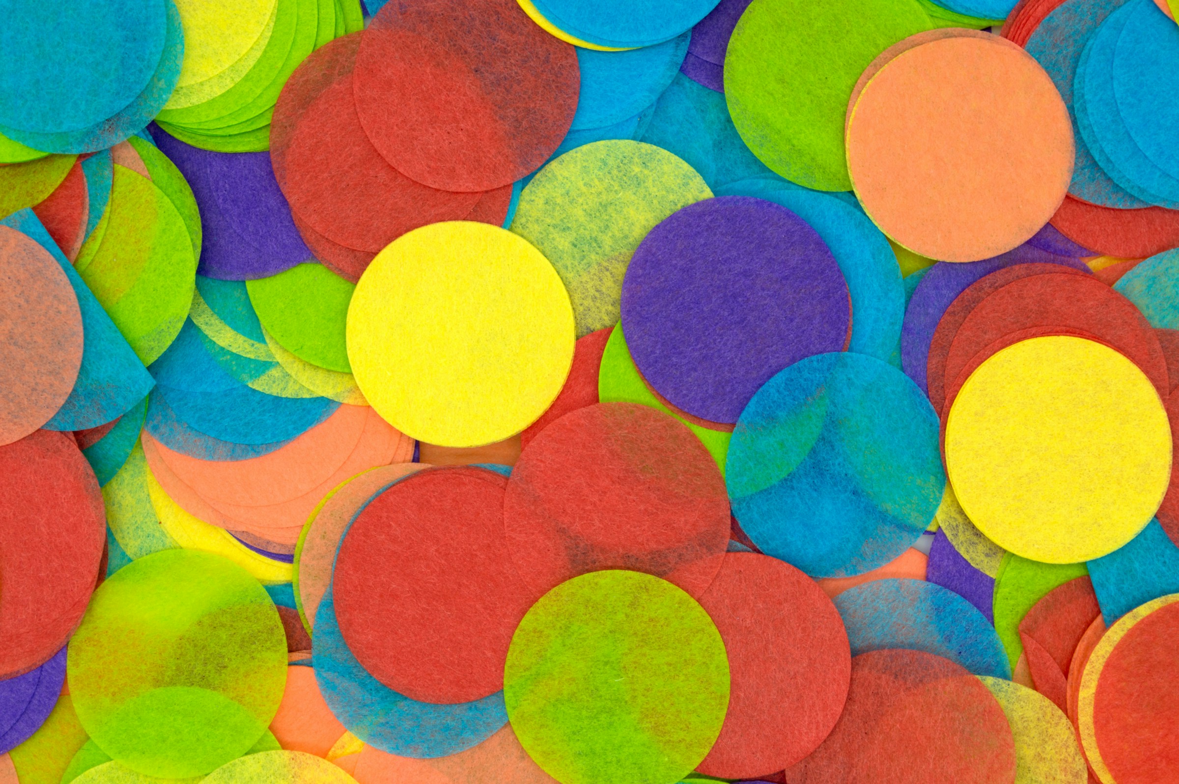 Bright colored paper confetti cut into circles